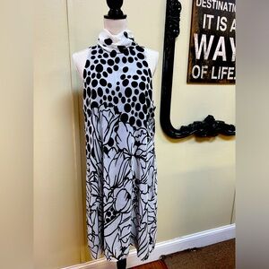 Boho Chic sleeveless dress with mock turtleneck & back zipper. Black & white